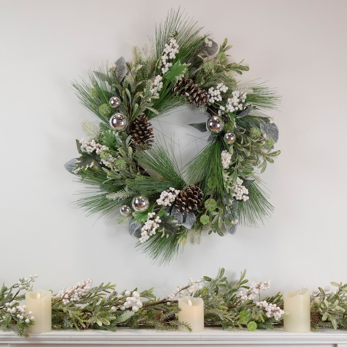Icy Frosted Greenery Wreath with Silver Ornaments and Berries 24 Inch Unlit
