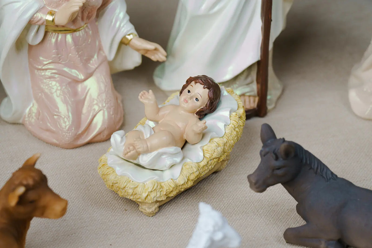 Eleven Piece Blush Pink and Ivory Resin Nativity Set with a Gloria Angel and Pearl Finish in Three Heights