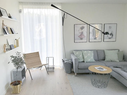 Adjustable Wall Lamp with Extended Arm and Rotating Shade, Cast Iron Counterweight