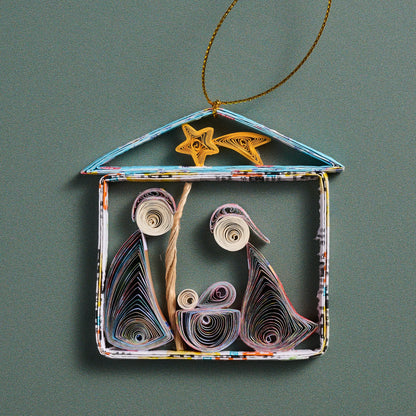 Quilled Paper Nativity Tree Ornament Showing the Holy Family Under a Shooting Star