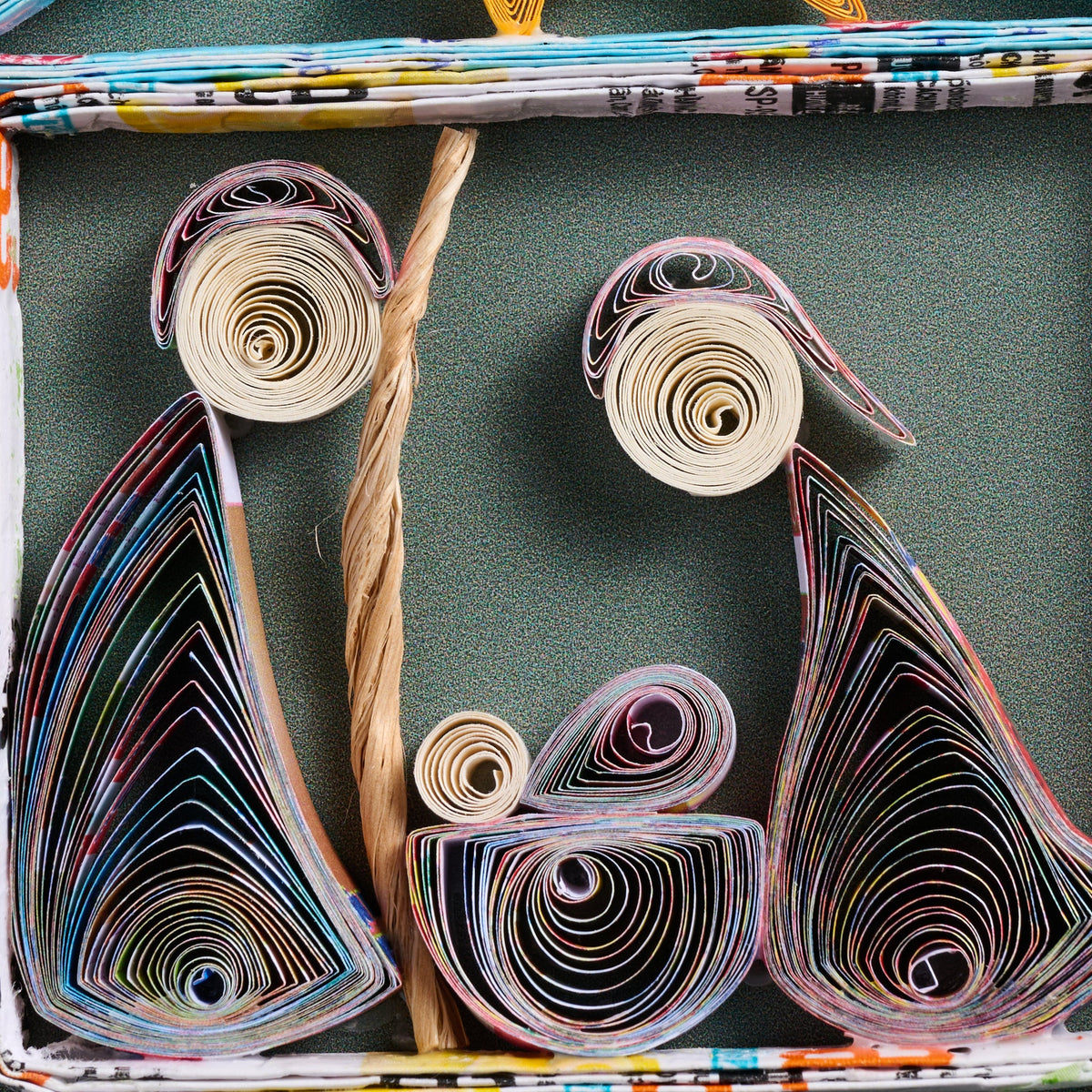 Quilled Paper Nativity Tree Ornament Showing the Holy Family Under a Shooting Star