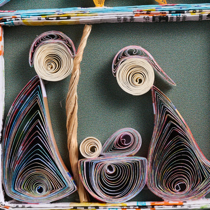 Quilled Paper Nativity Tree Ornament Showing the Holy Family Under a Shooting Star
