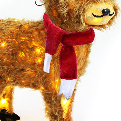 Shaggy Highland Cow Christmas Yard Figure with Warm White LEDs Red Scarf and Santa Hat
