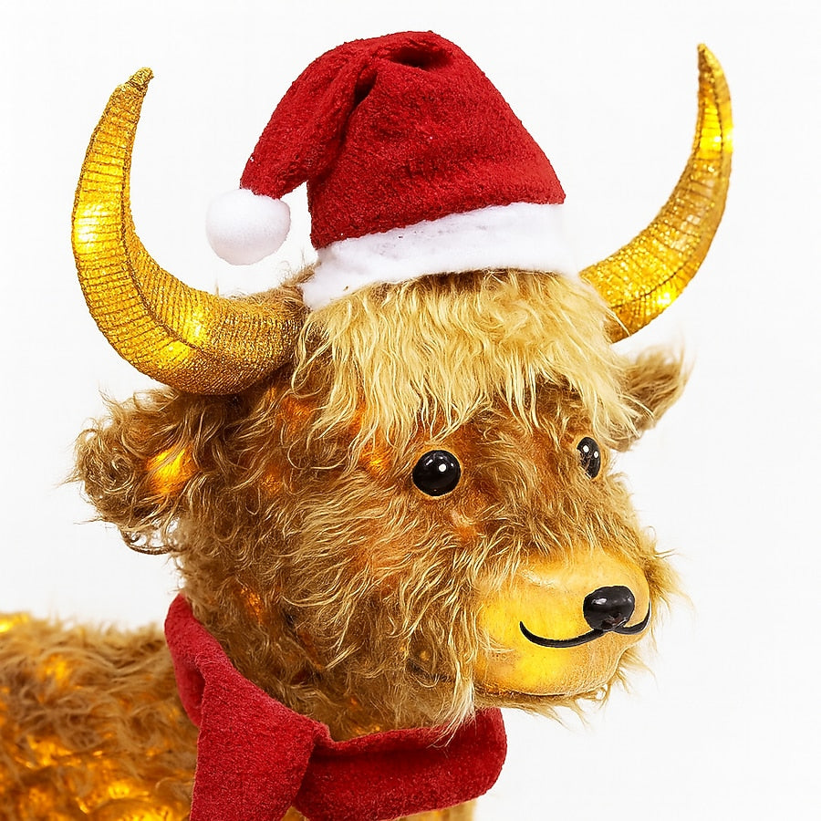 Shaggy Highland Cow Christmas Yard Figure with Warm White LEDs Red Scarf and Santa Hat