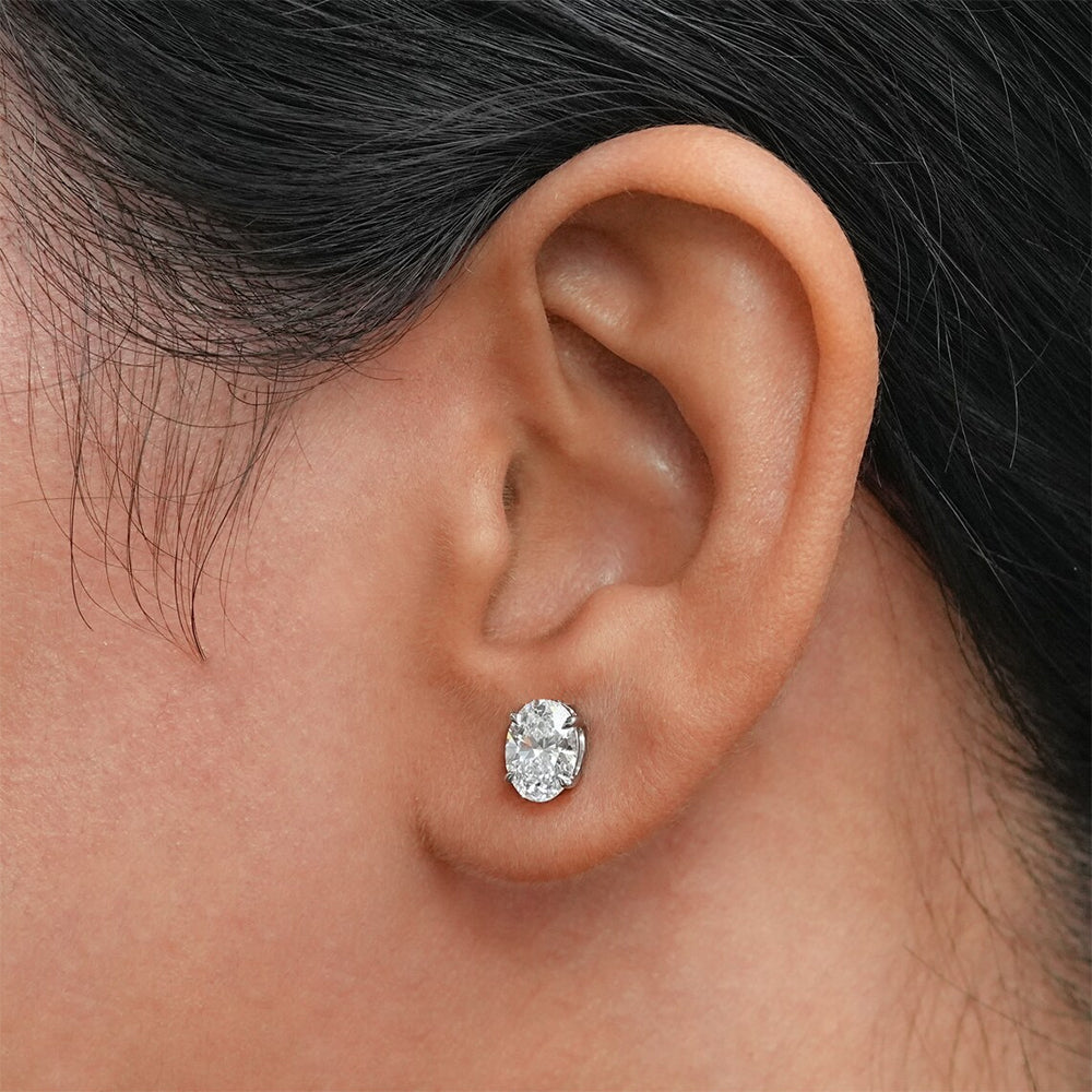 Moissanite Oval Stud Earrings with D Color VVS1 Clarity and Sterling Silver Setting