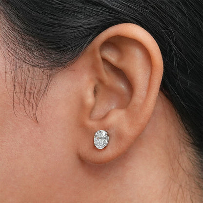 Moissanite Oval Stud Earrings with D Color VVS1 Clarity and Sterling Silver Setting