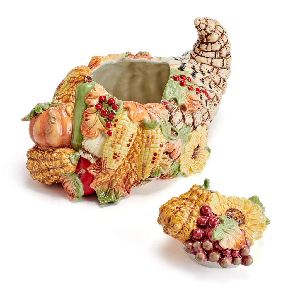 Open cornucopia cookie jar with the lid set beside it