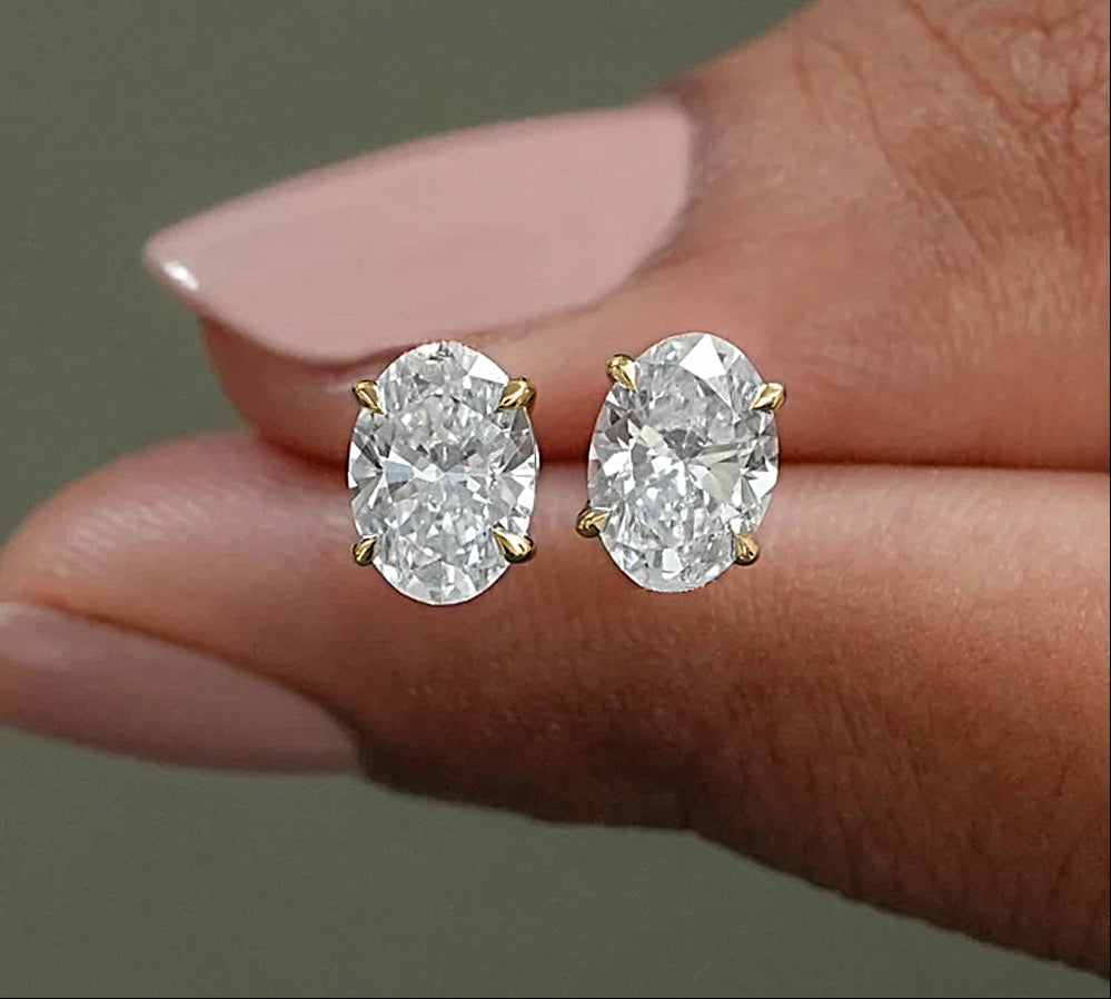 Moissanite Oval Stud Earrings with D Color VVS1 Clarity and Sterling Silver Setting