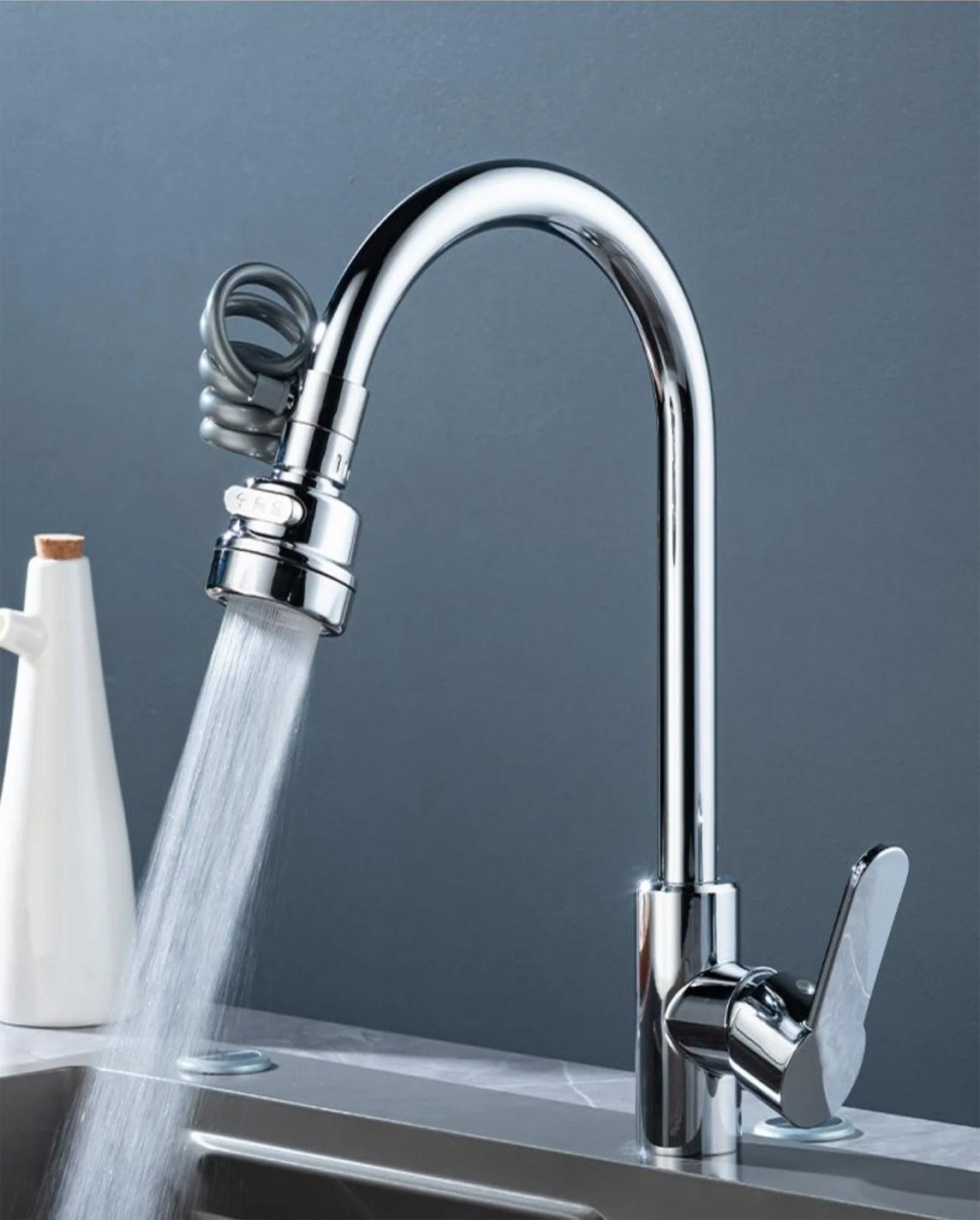 Faucet Extender with a 360 Degree Swivel, a Stretch Hose, Three Spray Modes and a Built In Filter