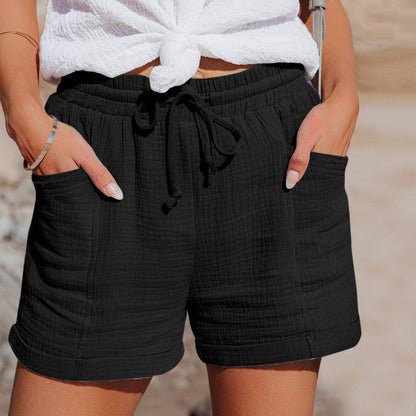 Relaxed Mid-Thigh Shorts with Drawstring Waist and Side Pockets