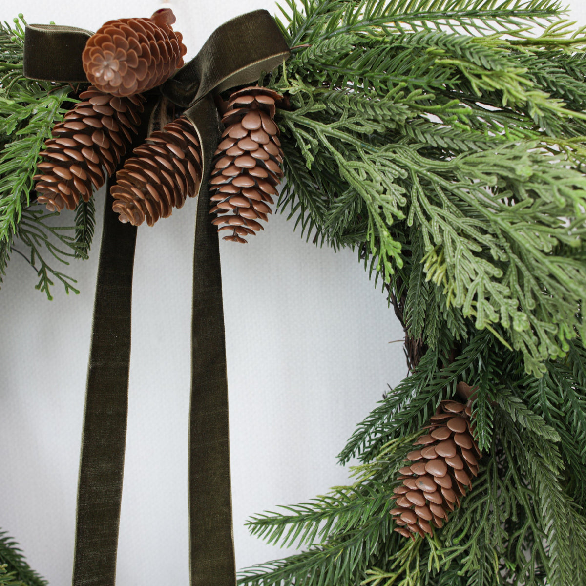 Heart Shaped Pine Wreath with Pinecone Accents and Hunter Green Ribbon, 24 Inches