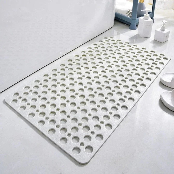 Suction Cup Shower Mat with a Textured Surface and Water Drainage in Seven Colors