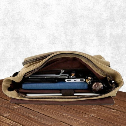 Mens Sling Bag with Canvas Satchel Design and Messenger Style Layout and Integrated Zipper Closures